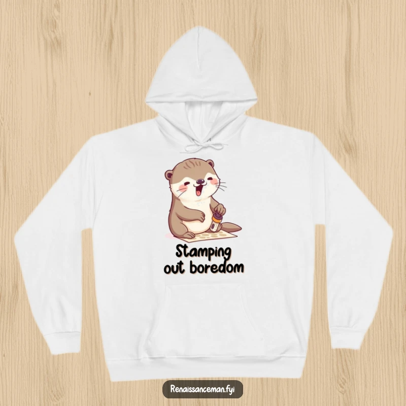 Funny otter stamping hoodie, a warm and cozy depiction of creative passion, perfect for craft lovers seeking a humorous and comfortable gift.