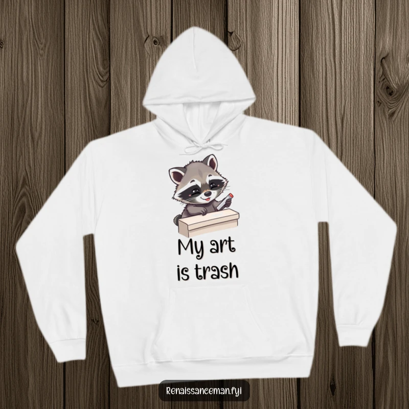Funny Giggling Raccoon Carefully Placing Chalk on Ledge, Cozy Hoodie for Climbers, Humorous Outdoor Gear.