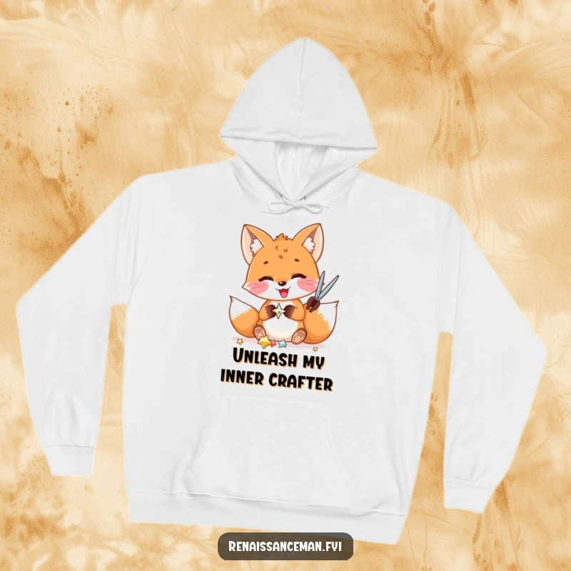 Funny hoodie: A delighted fox with scissors cuts a shiny embellishment, capturing a moment of intense, joyful crafting.