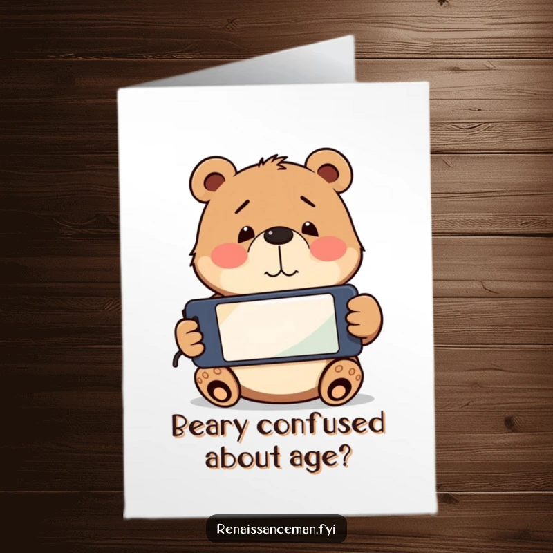 Funny Free Printable Birthday Card featuring a playful bear holding a phone upside down with a confused smile, lost in translation.