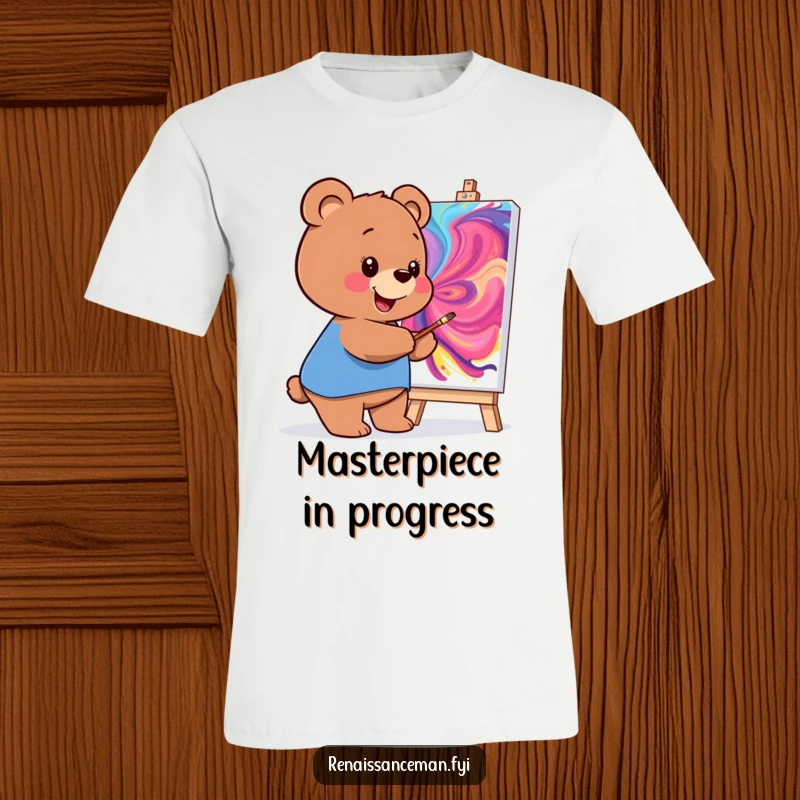 Funny T-shirt with a smiling bear creating a vibrant, swirling masterpiece on a canvas, perfect for art enthusiasts.